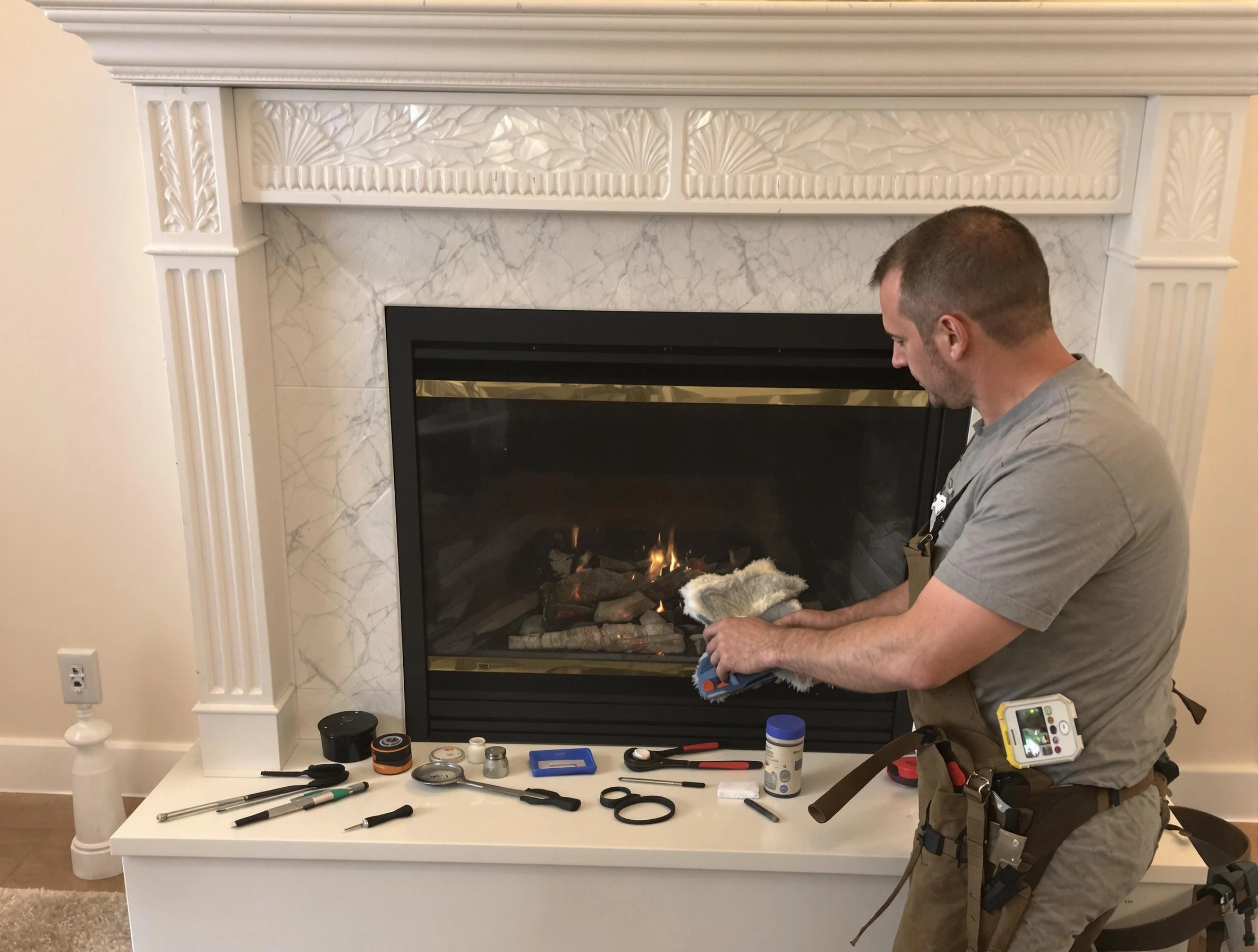 Burlington Chimney Sweep performing fireplace maintenance in Burlington, MA